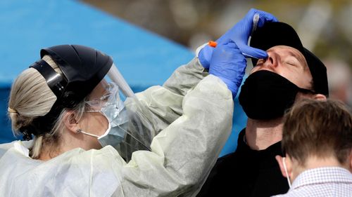A man being tested for coronavirus in New Zealand.