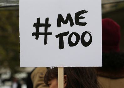 Protesters hold placards during a gathering against gender-based and sexual violence called by the Effronte-e-s Collective, on Republique square in Paris.