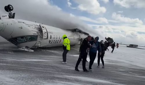 Passengers who survived a dramatic plane crash in Canada have recalled hanging upside down in the aircraft after it flipped on the runway.