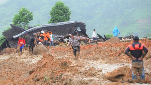 he landslide triggered by torrential rain has killed a number of people and left dozens of others missing on Indonesia's main island of Java.