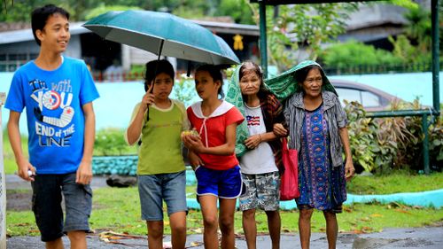 Tens of thousands flee as Christmas typhoon hits Philippines