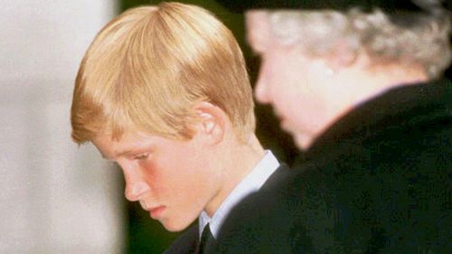 Prince Harry with his grandmother, Queen Elizabeth II, at his mother's funeral. (AAP)