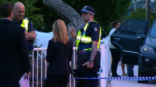 Police at the scene of the fatal shooting. (9NEWS)