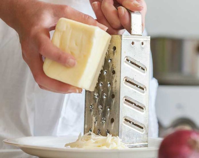 You've been grating your cheese wrong - man comes up with a genius hack  that means there's no more mess