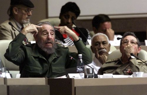 Fidel Castro and his brother Raul in a photo taken in 2011. (AAP)