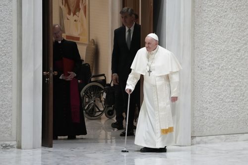 Pope Francis arrives for an audience with pilgrims from Rho diocese, in the Paul VI Hall, at the Vatican, Saturday, March 25, 2023. 