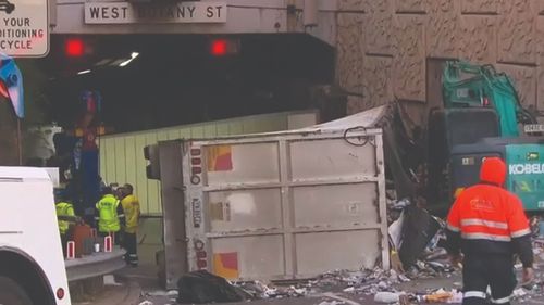 Cardboard was spilled across the road after the crash.