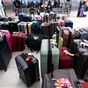 Carry-on vs checked bags, according to luggage experts