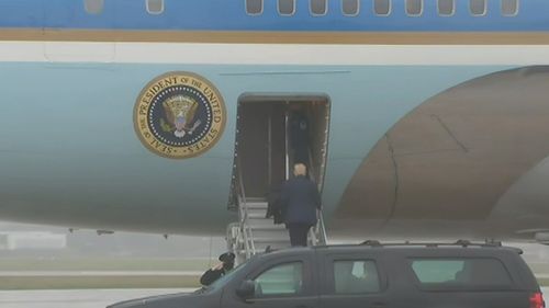 US President Donald Trump boards Air Force One to Florida.