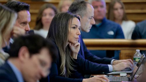 Karen Read listens to the testimony of Cellebrite digital intelligence expert Ian Wiffin, during her murder retrial, in Norfolk Superior Court, in front of Judge Beverly J. Cannone, in Dedham, Mass., Monday April 28, 2025. (Pat Greenhouse/The Boston Globe via AP, Pool)