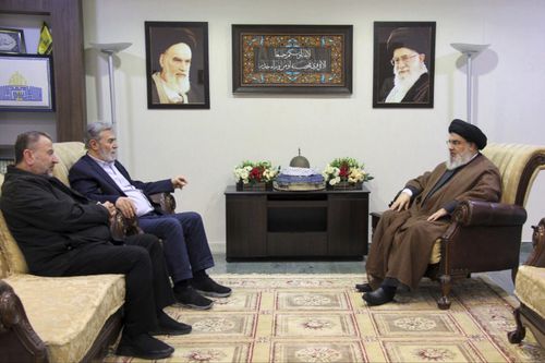 Hezbollah leader Sayyed Hassan Nasrallah, right, meets with Ziad al-Nakhleh, the head of Palestinian Islamic Jihad, center, and Hamas deputy chief, Saleh al-Arouri, in Beirut, Lebanon. Nasrallah met with top Hamas and Palestinian Islamic Jihad officials, their first reported meeting since the Hamas-Israel war erupted earlier this month and clashes began along the Lebanon-Israel border. 