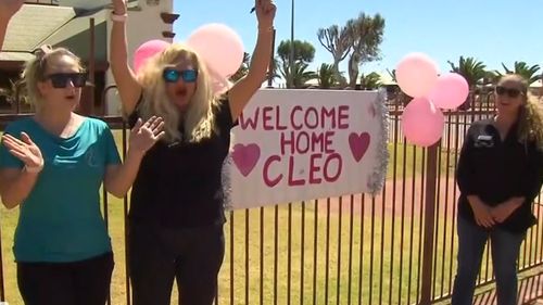 Locals celebrate after missing Cleo Smith, four, was found.