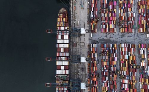 A ship and containers at the Port of Santos, in Santos, Brazil, are seen here in April. President Donald Trump signed executive actions on July 30, implementing a crippling 50% tariff on Brazil.
