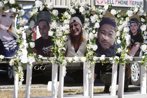 Photographs of victims of a mass shooting at a nearby gay nightclub are on display at a memorial on Tuesday, Nov. 22, 2022, in Colorado Springs, Colo. 