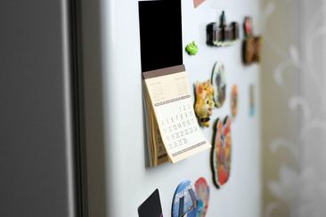 Magnets on a fridge.