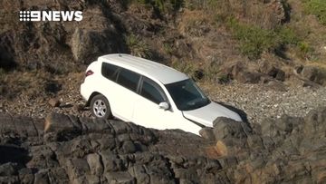 Car removed after driving over cliff
