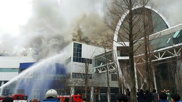 Four people have died after fire tore through a South Korean shopping centre. (AFP)