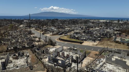 A general view shows the aftermath of a devastating wildfire in Lahaina, Hawaii, Tuesday, Aug. 22, 2023. Two weeks after the deadliest U.S. wildfire in more than a century swept through the Maui community of Lahaina, authorities say anywhere between 500 and 1,000 people remain unaccounted for. (AP Photo/Jae C. Hong)