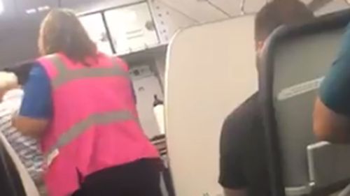 The man was kicked off the flight for 'aggressively disrupting' the safety demonstration, according to the airline.