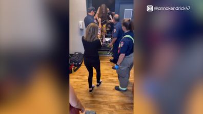 Anna Kendrick gets saved from an elevator by a group of Canadian firefighters.