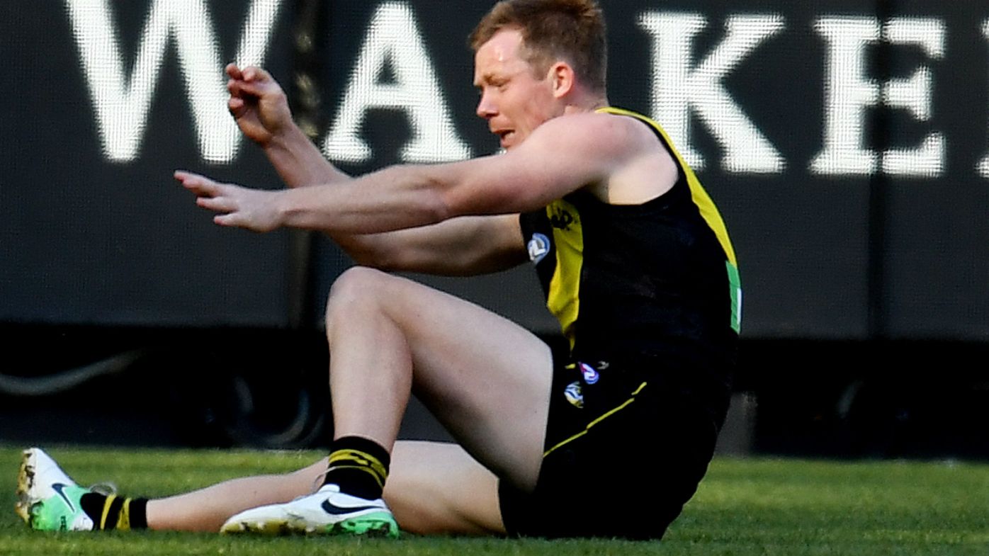 Jack Riewoldt concussed as Richmond holds off plucky St Kilda