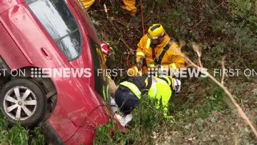 Driver plummets 100m down Melbourne cliff
