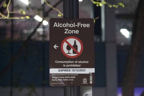 An alcohol-free zone sign in the Kings Cross area in Sydney, Australia, on Wednesday, Sept. 14, 2022. Australia's biggest city is dusting off long-held plans to bring the harbor metropolis to life after the sun goes down from spending on live music, and art and culture, to making late-night shopping a reality. Photographer: Brent Lewin/Bloomberg