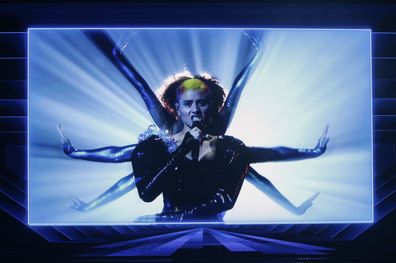 A pre recorded performance by Montaigne from Australia is shown on a video screen at the first semi-final of the Eurovision Song Contest at Ahoy arena in Rotterdam, Netherlands, Tuesday, May 18, 2021.