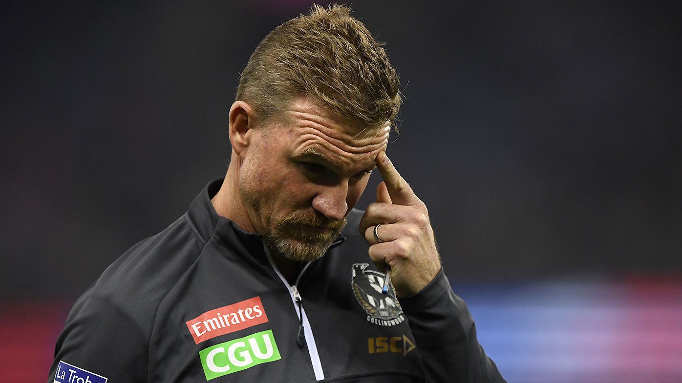 Collingwood fined $50,000 by AFL after Nathan Buckley's COVID-19 breach
