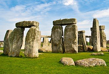 How many metres tall are Stonehenge's standing stones?