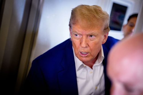 IN FLIGHT - JUNE 24: U.S. President Donald Trump speaks to members of the media aboard Air Force One on the way to the 2025 NATO Summit on June 24, 2025 in flight. This year's NATO summit, which brings together heads of state and government from across the military alliance, is being held in the Netherlands for the first time. Among other matters, members are to approve a new defense investment plan that raises the target for defense spending to 5% of GDP.  (Photo by Andrew Harnik/Getty Images)