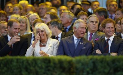 (L-R) Prince William, Duke of Cambridge, Camilla, Duchess of Cornwall, Prince Charles, Prince of Wales and Prince Harry laugh during the opening ceremony of the Invictus Games at the Queen Elizabeth Park on September 10, 2014 in east London, England. The Invictus Games which will run from September 10-14, is an international sporting event for wounded servicemen and women from 13 countries.