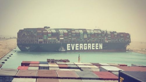 The Ever Given (labelled as the Evergreen) is jammed in the Suez Canal.