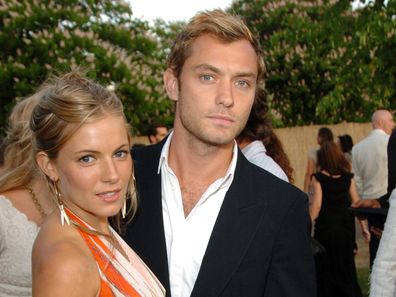 Sienna Miller and Jude Law in London in June 2004.