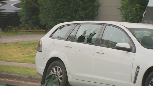 Over a dozen bullets were fired at the white Holden.