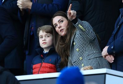 Kate Middleton, Duchess of Cambridge speaks to their son Prince George of Cambridge prior to the Guinness Six Nations Rugby match between England and Wales at Twickenham Stadium on February 26, 2022