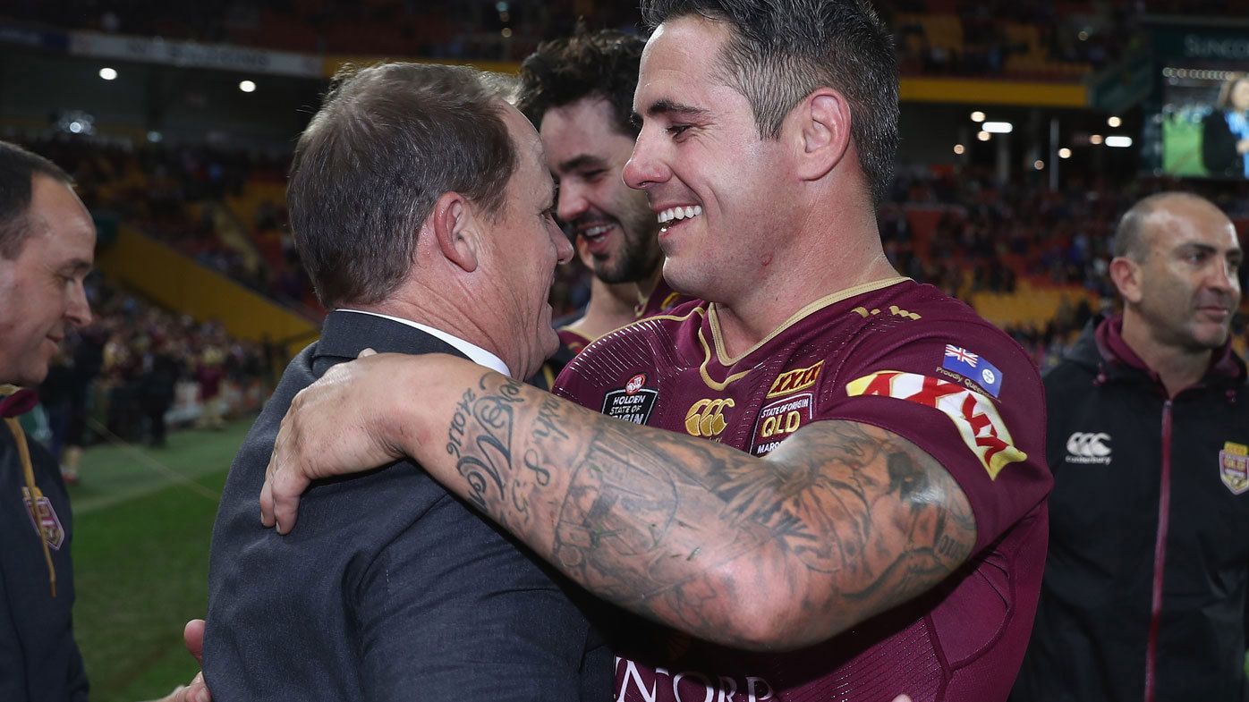 Walters and Parker share an embrace during the 2016 Origin series. 