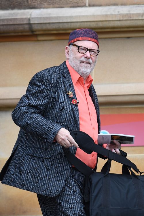 Music journalist Glenn A Baker arrives for the funeral of AC/DC co-founder and guitarist Malcolm Young. (AAP)