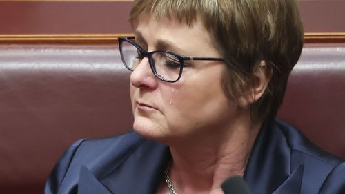 Tears stream down the face of Minister for Defence Linda Reynolds during Question Time at Parliament House in Canberra last week. Photo: Alex Ellinghausen