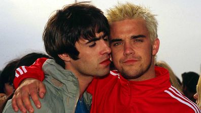 Robbie Williams and Liam Gallagher in 1995.
