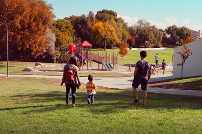 Family playing at the park