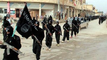 Fighters from Islamic State marching in Raqqa, Syria, in a photo dated from 2014.