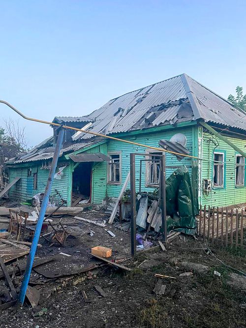 damaged house after shelling by the Ukrainian side in the city of Sudzha, Kursk region that borders Ukraine, Tuesday, Aug. 6, 2024.  