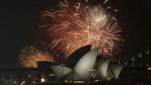 Fireworks explode over Sydney's iconic Opera House on New Year's Eve 2014. (AAP)