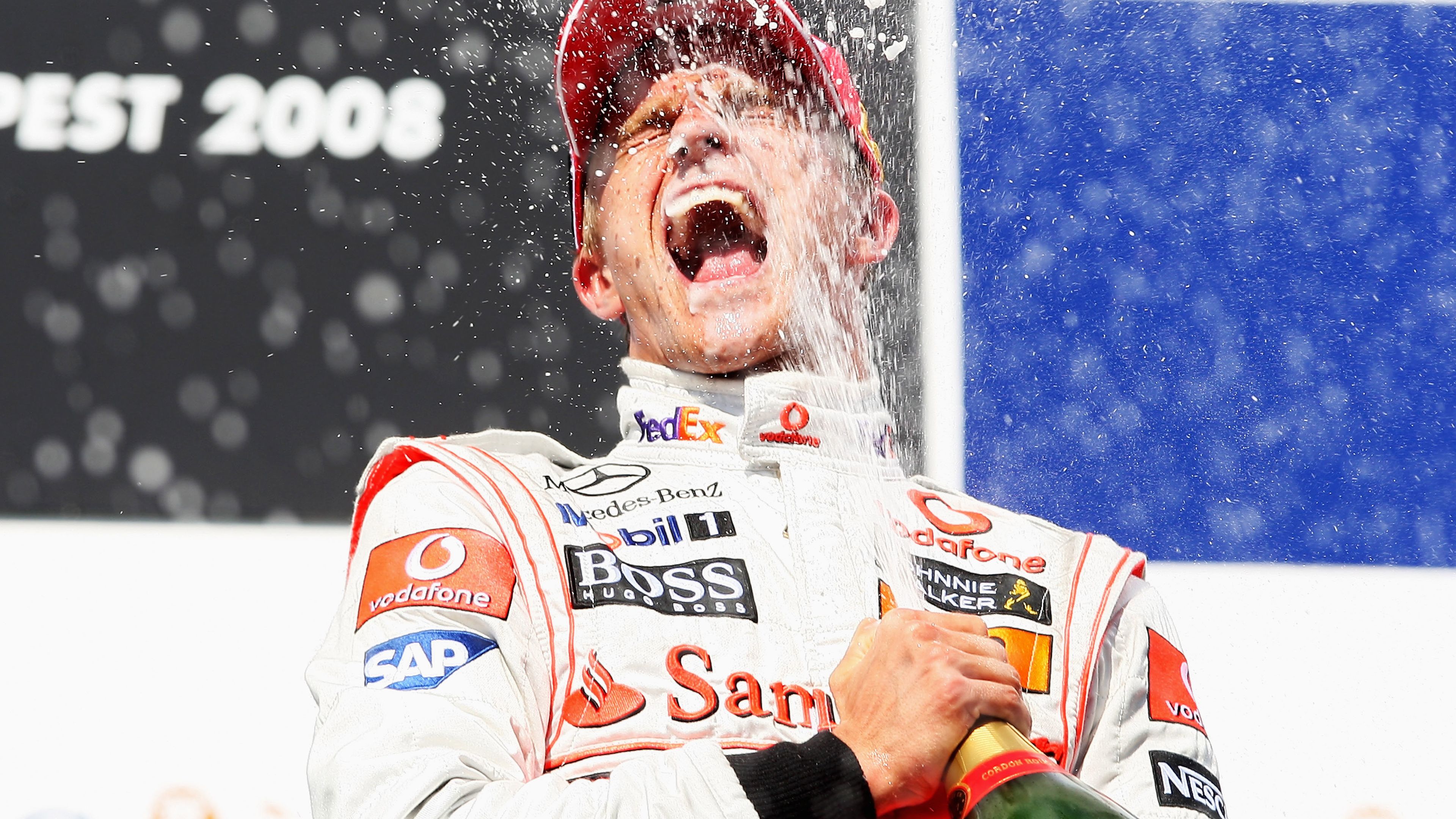 Heikki Kovalainen celebrates winning the 2008 Hungarian Grand Prix.