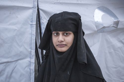 British-born Shemima Begum, 19, from Bethnal Green in London, stands outside the tent in which she's currently living with her newborn son at a detainment camp for foreign ISIS women and their children, on February 22, 2019, in Al Hol, near Hassakeh in North Eastern Syria.
