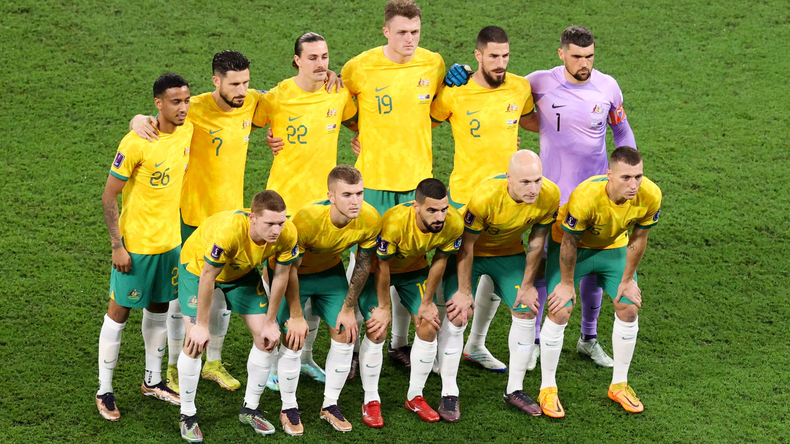 DOHA, QATAR - DECEMBER 03: Players of Australia line up for team photo during the FIFA World Cup Qatar 2022 Round of 16 match between Argentina and Australia at Ahmad Bin Ali Stadium on December 03, 2022 in Doha, Qatar. (Photo by Zhizhao Wu/Getty Images)