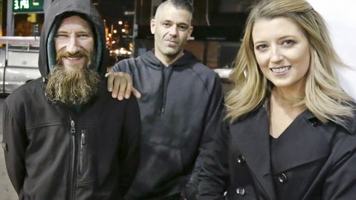 Johnny Bobbitt Jr., left, Kate McClure, right, and McClure's boyfriend Mark D'Amico. (Elizabeth Robertson/The Philadelphia Inquirer via AP and AAP)