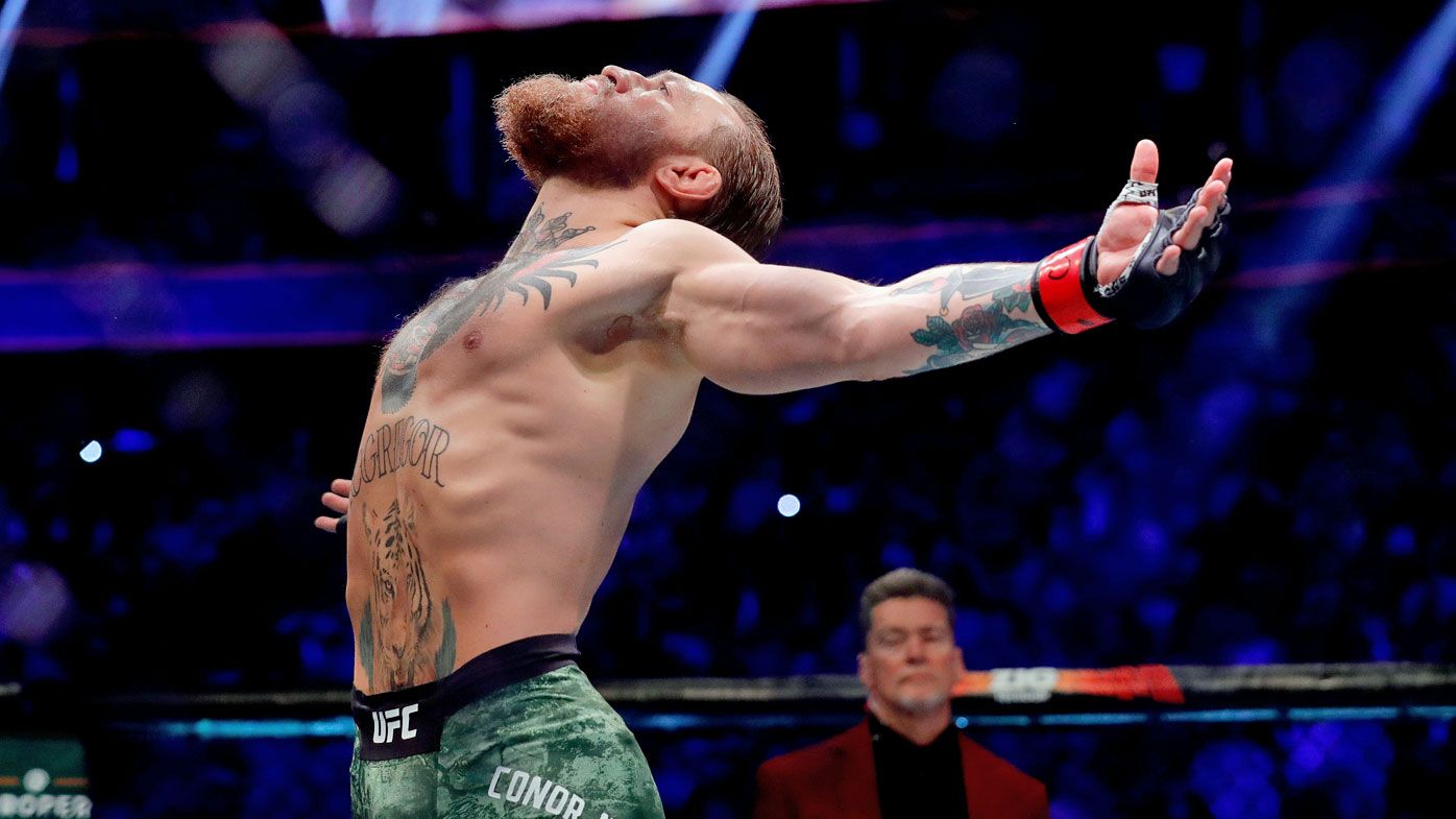 Conor McGregor reacts before taking on Donald Cerrone in their welterweight bout 
