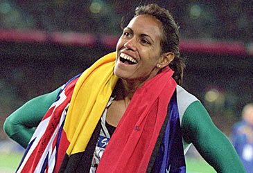 In which event did Cathy Freeman win gold at Sydney 2000?